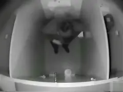 College girl examines her pussy in toilet footage