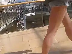 Candid teen 18+ shopping in denim hotpants