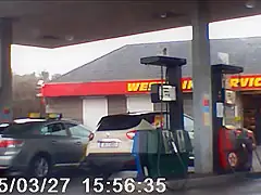 cute girl at the pumps ( nice booty )